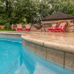 Natural Stone Coping on inground gunite swimming pool in Lafayette, LA