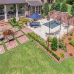 Custom courtyard with cocktail swimming pool in Lafayette, LA