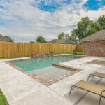 Rectangular Gunite Swimming Pool with brick coping in Lafayette, LA