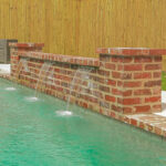 Brick water feature wall in Lafayette, LA