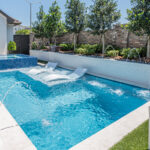 Small Courtyard inground gunite swimming pool with tanning ledge | Lafayette, LA