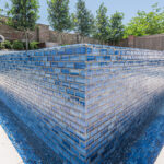 Glass tile perimeter overflow spa | Lafayette, LA