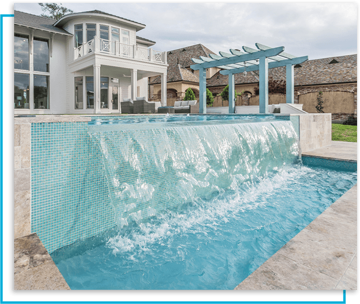 Outdoor pool with waterfall water feature